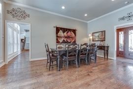 Hooker Dining Room Table, 6 side chairs, 2 arm chairs and buffet table. Refinished in the past 6 months with new leather seats on the chairs. Tapestry on the wall is also for sale.
