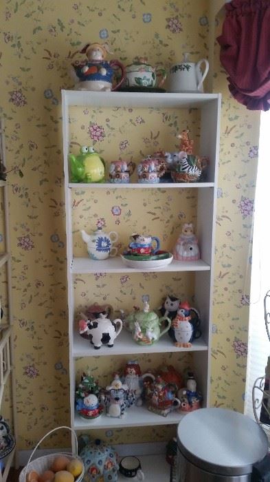 ANOTHER WHITE SHELF PLUS ALL THE TEA POTS