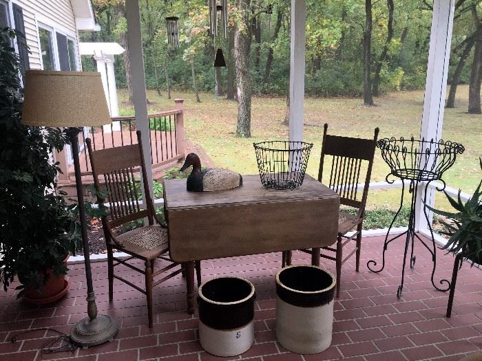Drop leaf table with 2 chairs -  Crocs  -  Lamp  - Planter  -  