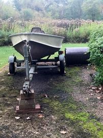 Aluminum fishing boat and trailer  -  Lawn roller