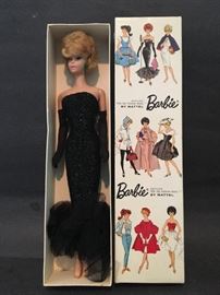 Vintage Barbie with bubble cut hair do, not a repop.   Same era as ones we have had in a previous sales