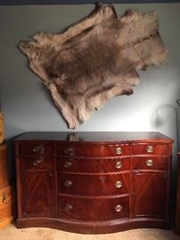 Vintage flame grain mahogany Duncan Phyfe style sideboard with original pulls, circa 1950.