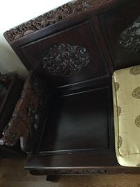 Note the carvings behind the cushions