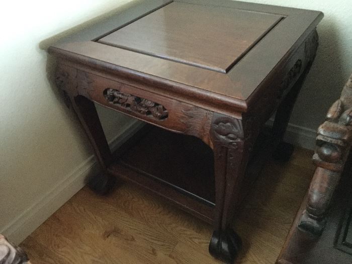One of a pair of end tables that matches Living Room Suite of fine carved Chinese furniture