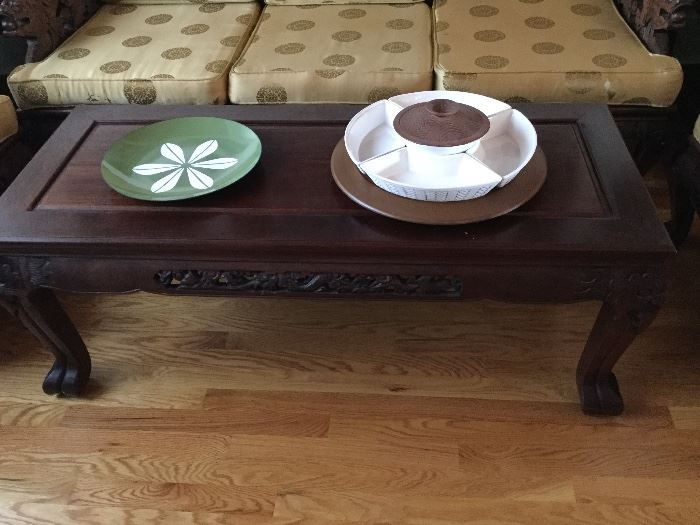 Coffee table to match living room suite of carved Chinese furniture