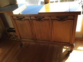 Vintage Fold out Bar top rolling server that matches the sideboard by for Charles