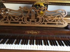 Chickering piano for a large space, this was purchased years ago at a charity auction. Gorgeous large bench tucks neatly below. One strip of wood needs glue by keys, closes completely for keeping in good condition.