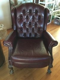 Leather  recliner chair (one of two) in upright position by Bradington Young