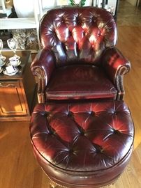 Club chair of leather with ottoman, one of a pair in the setting sunlight, by Hancock and Moore, leather color actually matches the recliner chairs