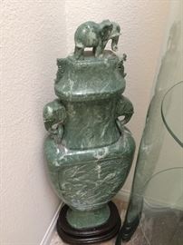 One of two urn style vases with cover, this one has chip on top elephant ear