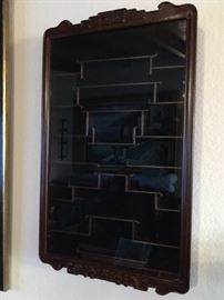 One of two Asian curio cabinets for your treasures