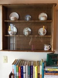 Cup and saucer wall cabinet, and a few cups and saucers too