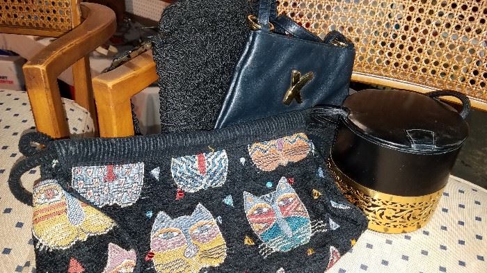 Much vintage and modern women's and men's clothing. Nice selection of collectible purses. Laurel Burch cats handbag. Paloma Picasso, Carrie Forbes