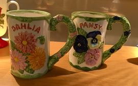 Painted pair of ceramic mugs