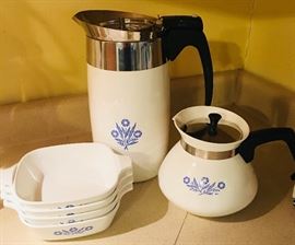 Two stove coffee pots by Corningware plus 4 oven safe dishes.