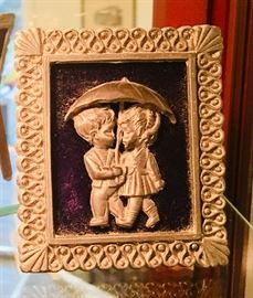 Small pewter boy and girl framed