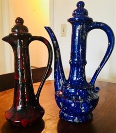 Unique large ceramic pitchers.