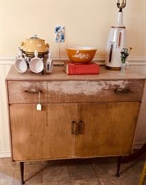 Vintage cabinet. Very mid mod and sturdy. Paint it leave Natural. Like new inside!