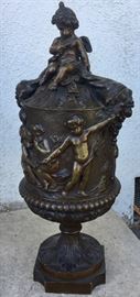 BRONZE COVERED URN WITH CHERUBS THIS PIECE IS HEAVY!