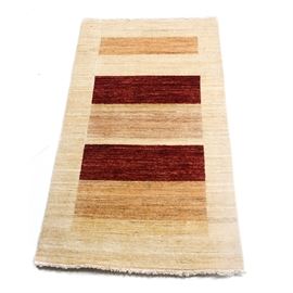 Hand-Knotted Persian Pakistani Gabbeh Accent Rug: A hand-knotted Persian Pakistani Gabbeh accent rug. This wool rug features a modern style color block central field in burgundy, cream and sand, surrounded by a band of ecru. An overcast, selvedge edge and white warp fringe complete this unsigned rug.