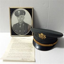 WWII Era Military Collectibles: A lot of three circa WWII era military collectibles. Included is a framed black and white 8×10 photograph of an Army serviceman, along with a Bancroft fur felt Army hat with crest, and a letter dated January 9, 1946, relating to a family’s missing son since January 8, 1945, after the B-29 bomber he was assigned to went missing during a flight from Kansas to Puerto Rico, with rough weather being the cause of lost signals, and presumed dead after a year of no signs of the crew, signed by Edward Witsell Major General.