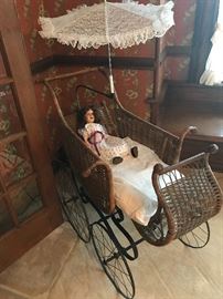 Victorian Baby Stroller. Vintage , Antique Doll with open mouth and teeth. Eyes open and close