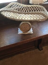 Antique wicker baby scale