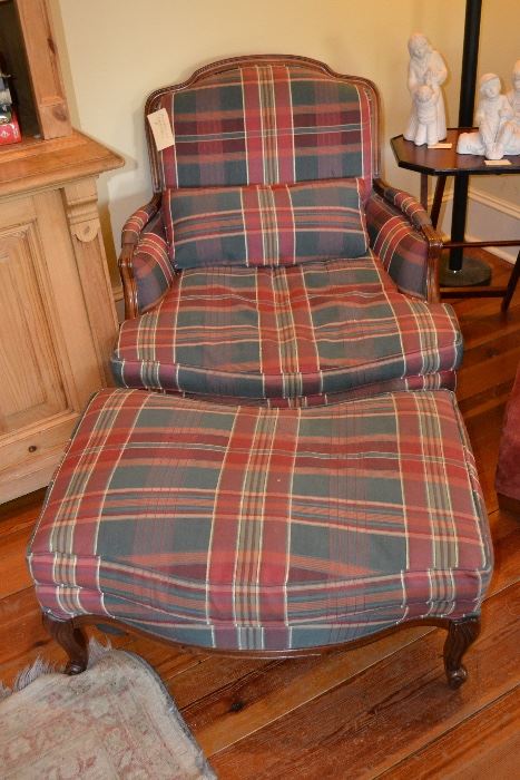 Large comfortable armchair with ottoman.