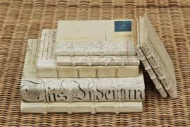 Group Of Parchment Covered Inspirational Books For Decorating