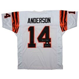 Ken Anderson Signed Jersey COA: A Ken Anderson autographed Cincinnati Bengals replica jersey. Ken signed the back “4” and added, “81 NFL MVP” with a silver marker. Ken played his entire career with the Bengals from 1971-1986. His signature was authenticated by Leaf Authentics; their hologram is on the “4” and their card is included.