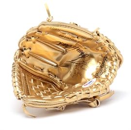 Johnny Bench Signed Rawlings Mini Gold Glove PSA COA: A (HOF) Johnny Bench signed Rawling mini Gold Glove. Johnny sided this inside pocket of the mini glove in black marker. The autograph is bold and smudge free and has been professionally authenticated by PSA with hologram affixed to the glove. There is also an accompanying PSA certification card accompanying this item. Johnny is considered one of the greatest catchers in the history of Major League Baseball. The Reds retired his jersey number “5.”