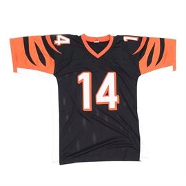 Andy Dalton Signed Bengals Jersey: An Andy Dalton Cincinnati Bengals signed NFL replica football jersey. Made of nylon and mesh, Andy signed this jersey in black marker and added his number “14” after his name. The autograph is bold and smudge free and has been professionally authenticated by “GT Sports Marketing” with hologram affixed to the jersey. There is also an accompanying certification card enclosed. With sewn on numbers and lettering, the jersey is a size XL. Andy is the Cincinnati Bengals starting quarterback. He played collegiately at TCU and is an NFL All-Pro selection.