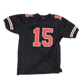 Ezekiel Elliott Signed Ohio State Football Jersey COA: An Ezekiel Elliott signed replica Ohio State NCAA football jersey. Ezekiel signed the backside of the jersey in black marker and added his jersey number “15” after his signature. The autograph is bold and smudge free and has been professionally authenticated by JSA with hologram affixed to the jersey. There is also an accompanying JSA card enclosed. With sewn on lettering and numbers, this jersey has no manufacturer’s tag. The jersey is made of nylon and mesh and is a size XL. Ezekiel was the starting back on Ohio States National Championship Team in 2014. He now plays for the Dallas Cowboys and is one of the best running backs in the NFL.