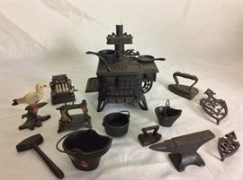 Pot Belly Stove Toy and miniature caste iron toys.