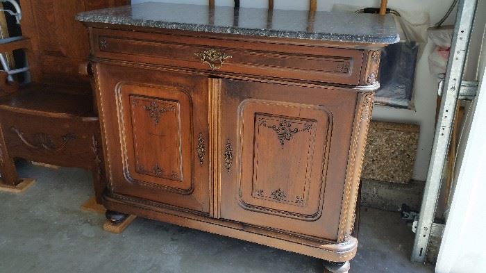 Antique carved, marble top French cabinet (carving matches the armoires) $900