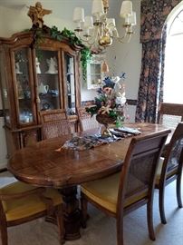 Table has inlay on each end with 6 chairs