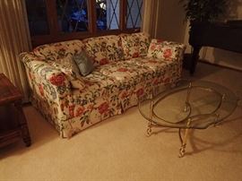 FLORAL SOFA / BRASS & GLASS COFFEE TABLE