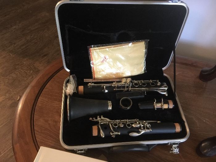New Clarinet in box with music stand