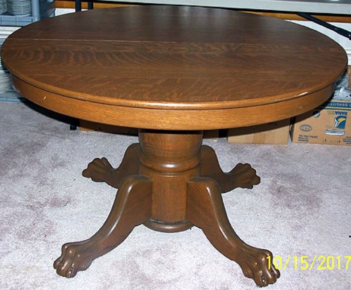 Oak claw foot table  ( 45 in. diameter)