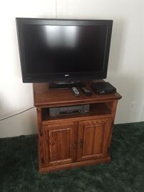 RCA flat screen TV w/entertainment stand