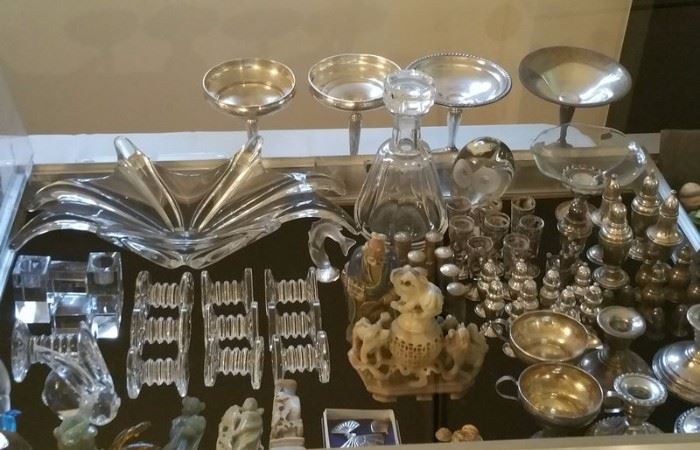 Baccarat splash bowl and candle holders, crystal knife rests, Lalique,  sterling silver salts, cream and sugar, jade and soapstone