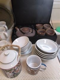 Asian-style tea pots and serving bowls