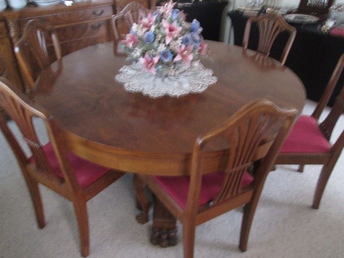 Fabulous dining room table/6 chairs with 3 leaves and pads.  Burled Maple and Claw Foot Pedestal