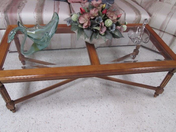 Traditional coffee table, beveled glass, with florals and sculpture