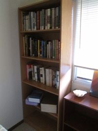 Several tall bookcases and short ones, too