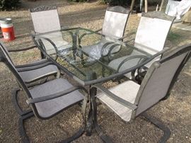 Metal and glass patio table/6 chairs
