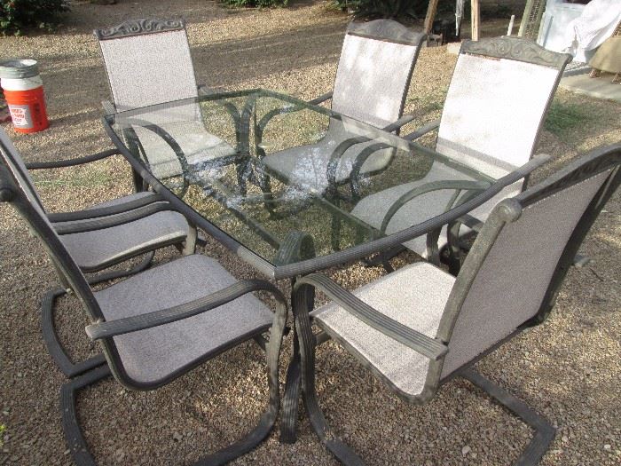 Metal and glass patio table/6 chairs