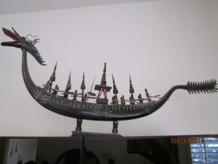 Horn carved into a dragon ship