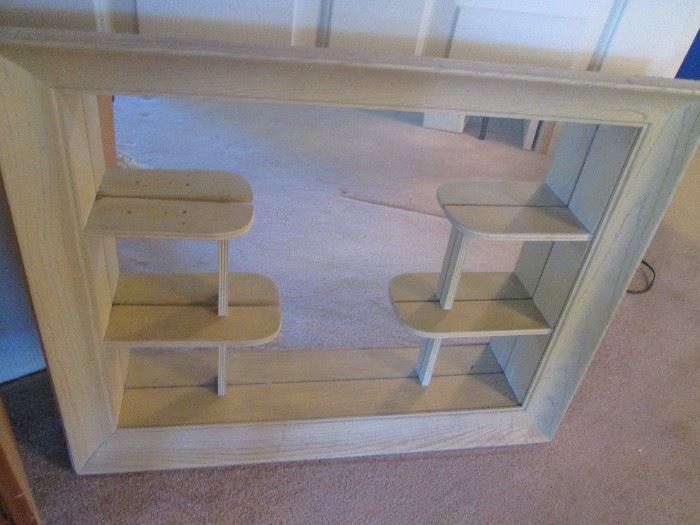 WOW!  What a cool shadow box mirror with display shelves.  Retro at it's finest!