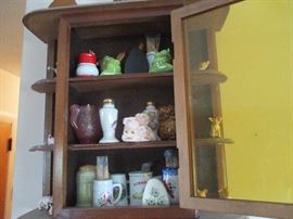 Curio cabinet filled with vintage Japanese